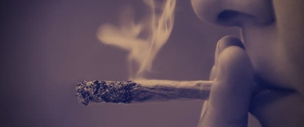 person smoking a joint