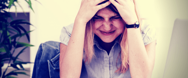 woman at work struggling to stay productive