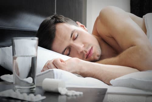 Man with zolpidem addiction in bed