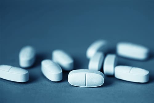 Blue zoloft pills spilled out