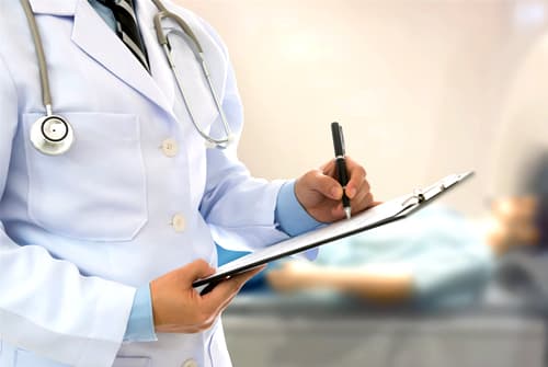 doctor writing a prescription