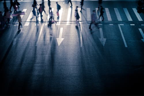 dark busy city crosswalk