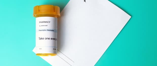 prescription pills on a prescription pad