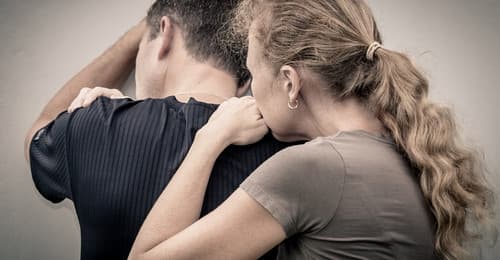 man and woman affected by addiction
