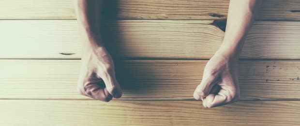 fists on a table